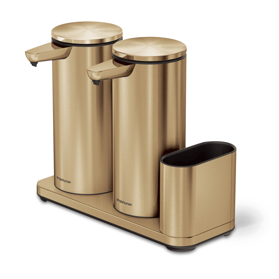 Angled view of Simplehuman Dual Sensor Pump 14 oz + Caddy in Brushed Brass, touch-free, organized dispensing.