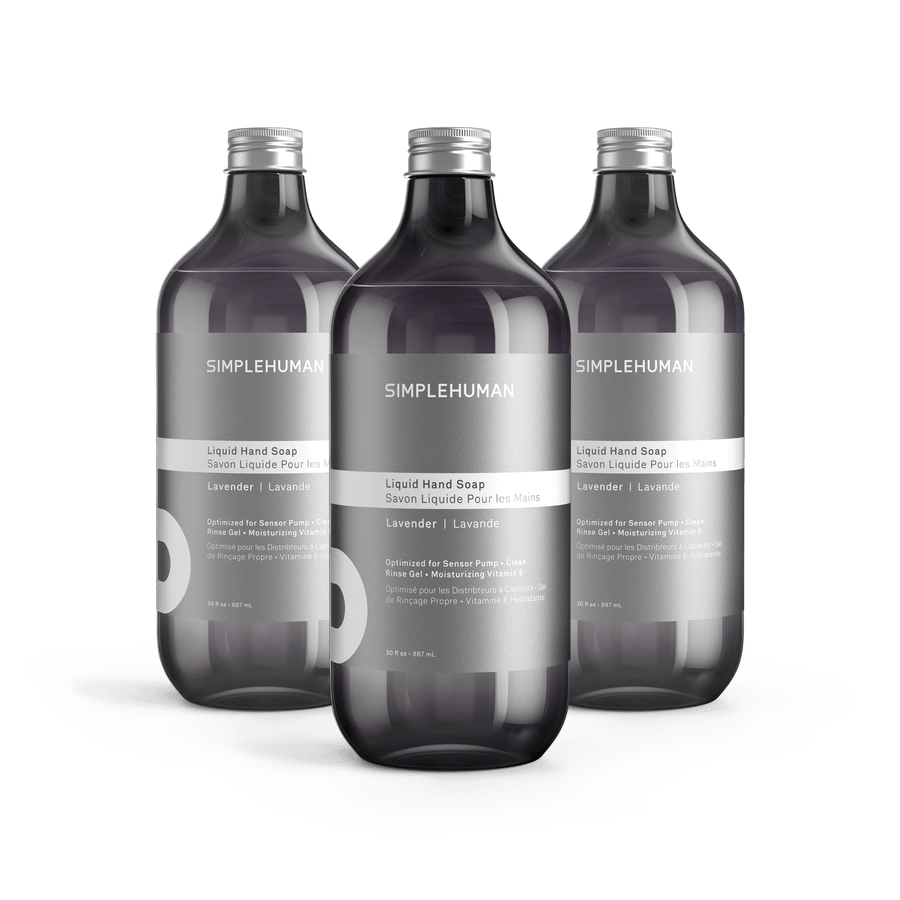 Simplehuman's Lavender Liquid Hand Soap in 3 charcoal colored bottles and titanium caps.