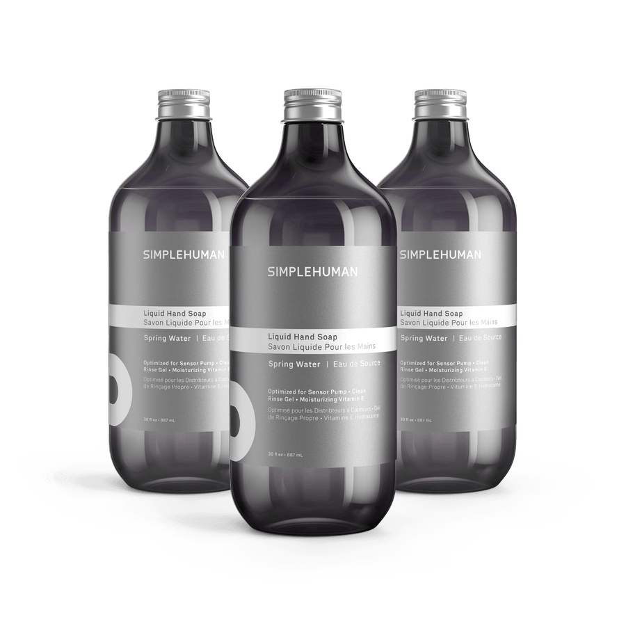 Simplehuman's Spring Water Liquid Hand Soap in 3 charcoal colored bottles and titanium caps.