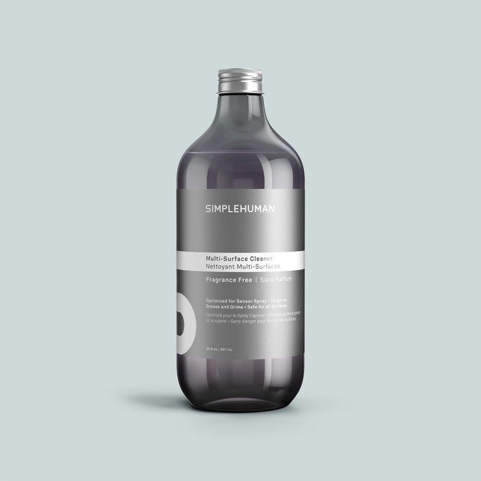 Simplehuman's Fragrance Free Multi-Surface Cleaner Refill Bottle on a colored background.