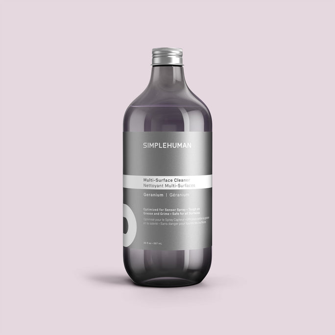 Simplehuman's Geranium Multi-Surface Cleaner Refill Bottle on a colored background.