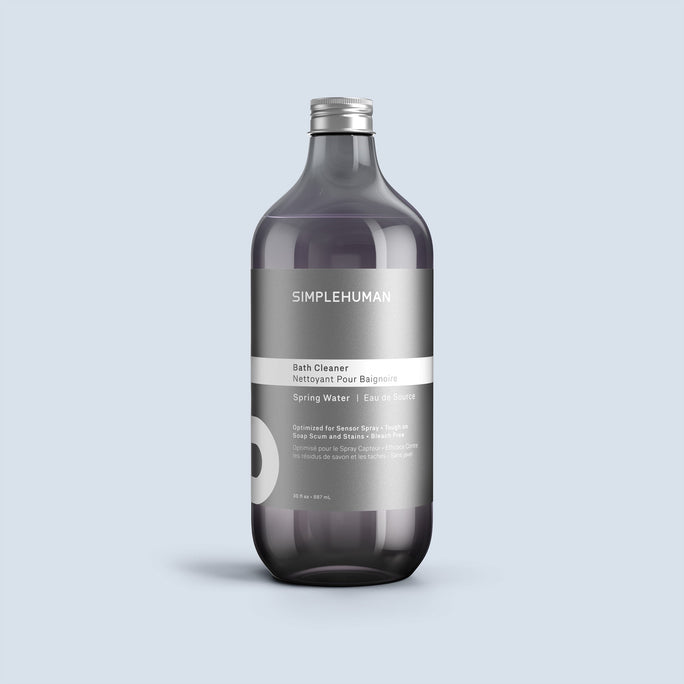 Simplehuman's Spring Water Bath Cleaner Refill Bottle on a colored background.