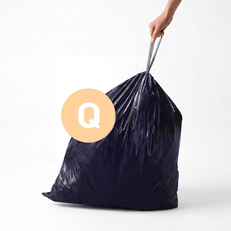 Simplehuman Nebula Code Q Custom Fit Liner being lifted, showing strong drawstring carry handle.