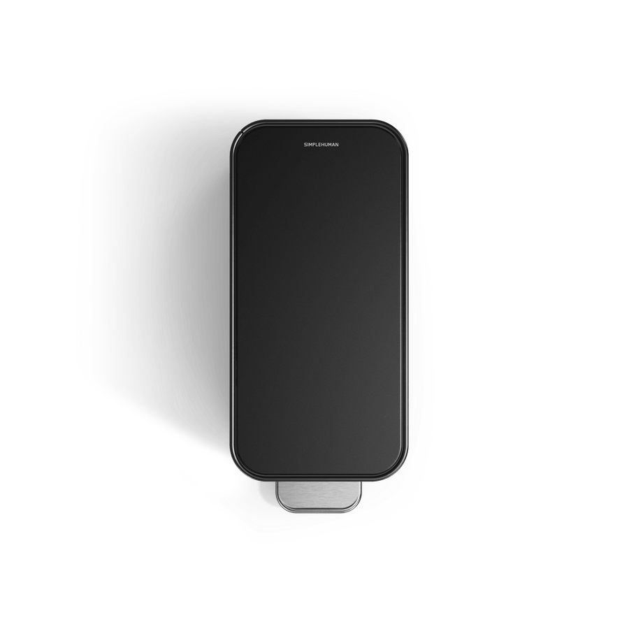 Simplehuman's 9L Slim Step Can in Matte Black top view showcasing the lid and pedal of the can. 