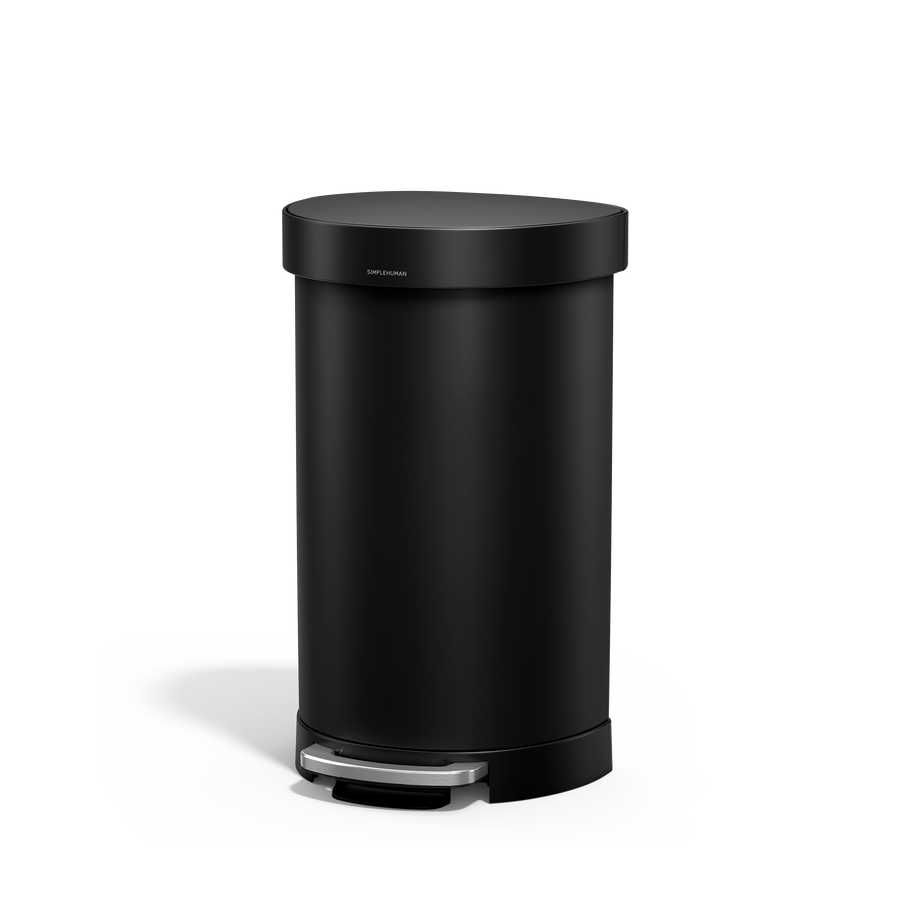 implehuman's 45L Semi-Round Step Can in Matte Black, side angled view. 