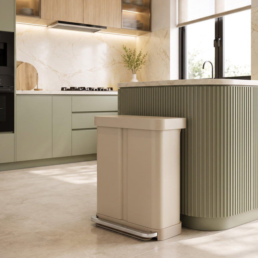 Simplehuman's 58L Step Recycler in a latte finish in a modern kitchen setting. 