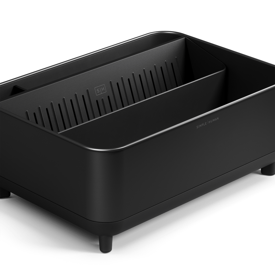 Close-up of Simplehuman Matte Black Bottle Dock showing interior drying tray and rack supports.