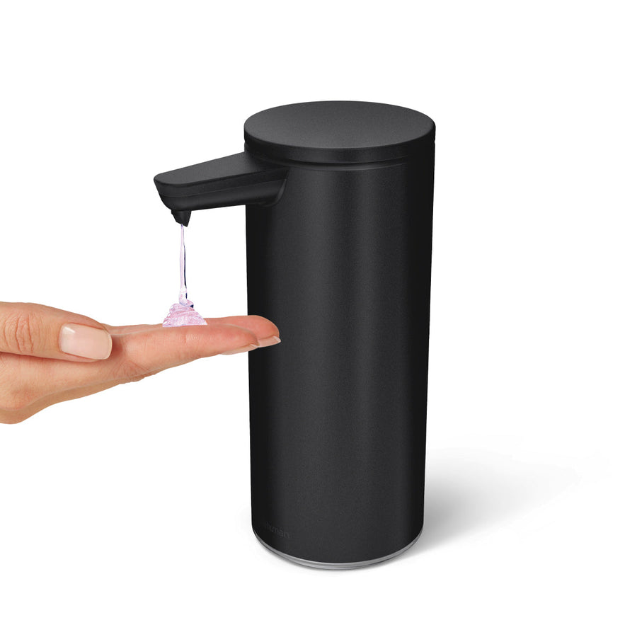 Detail view of Simplehuman 9 oz. Rechargeable Sensor Pump in Matte Black dispensing soap touch-free.