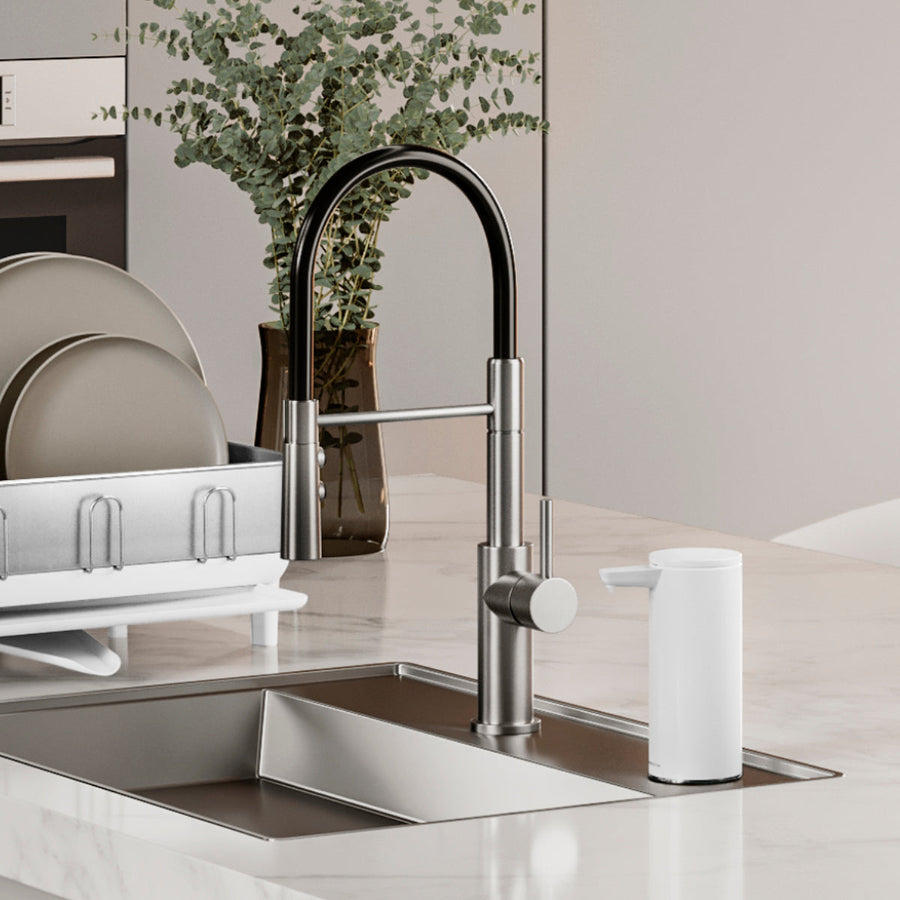 Simplehuman 9 oz. Sensor Pump in White next to modern kitchen sink and faucet, hands-free operation.