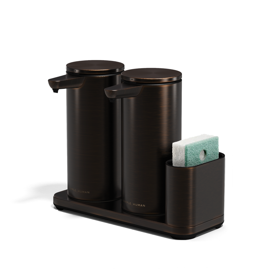 Angled studio shot of Simplehuman Dual Sensor Pump 14 oz + Caddy in Dark Bronze finish. Dual touch-free dispensing and organized storage.