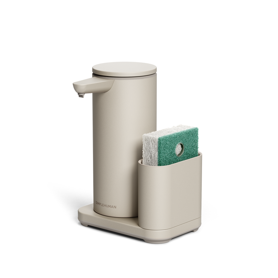 Simplehuman's Sensor Pump Dish with a sponge in the caddy, angled view. 