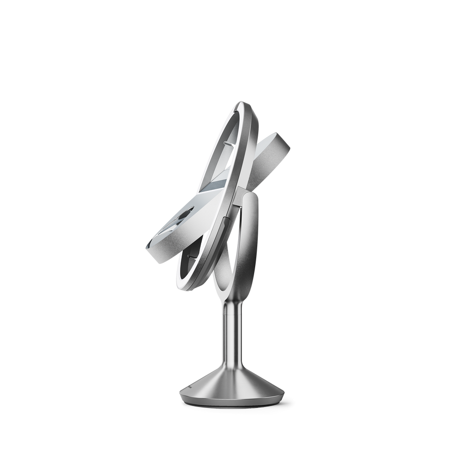 Simplehuman's Sensor Mirror Trio Max in Brushed. Image of mirror flipping automatically from a side view.