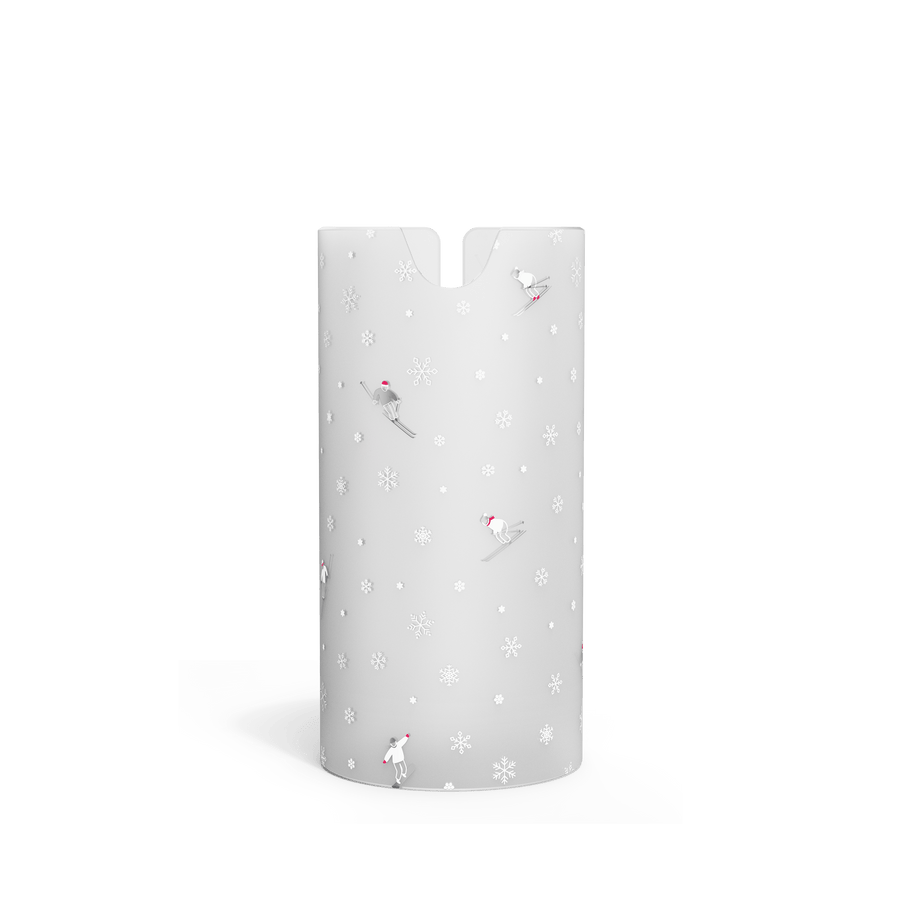 Front view of white, frosted holiday-themed sleeve for Simplehuman 9 oz. Sensor Pump, featuring small skiers and snowflakes.