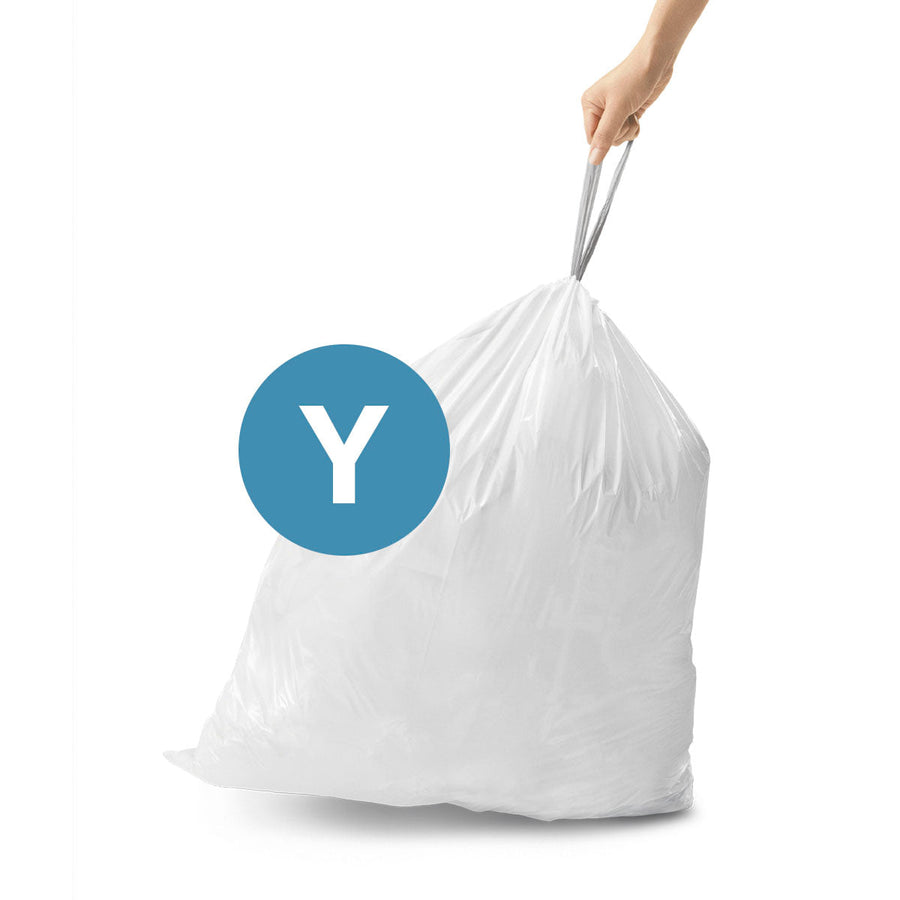 Simplehuman Code Y white Custom Fit Liner, strong drawstring being used as a carry handle.