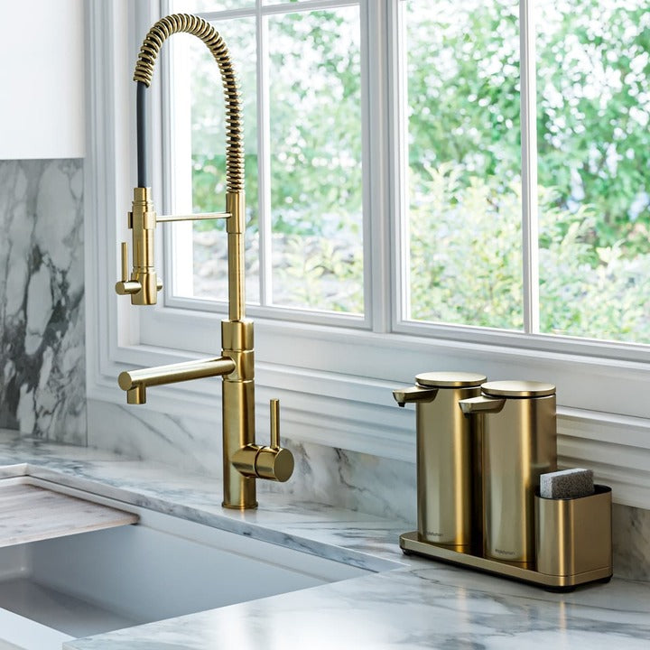 Simplehuman Dual Sensor Pump 14 oz + Caddy in Brushed Brass on marble counter, touch-free organized kitchen dispensing.