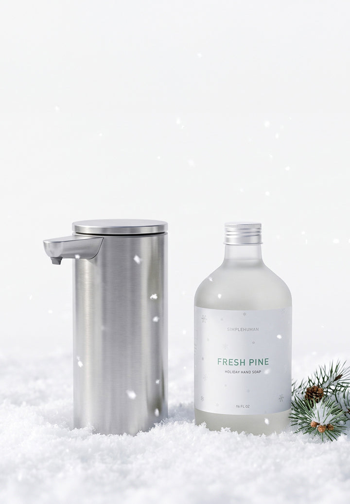 Simplehuman's Hero Image on Mobile featuring a 9 oz. Liquid Sensor Pump and their limited edition Fresh Pine Holiday Soap. 