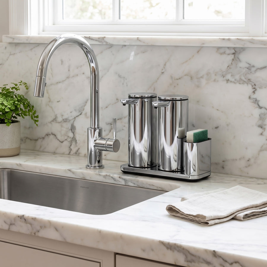 Simplehuman's Dual 14 oz. Sensor Pump in Polished in a modern kitchen setting with marble counter top.