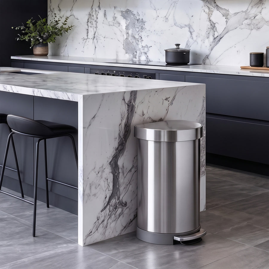 Simplehuman's Semi-Round Step Can in Brushed in a modern kitchen setting. 