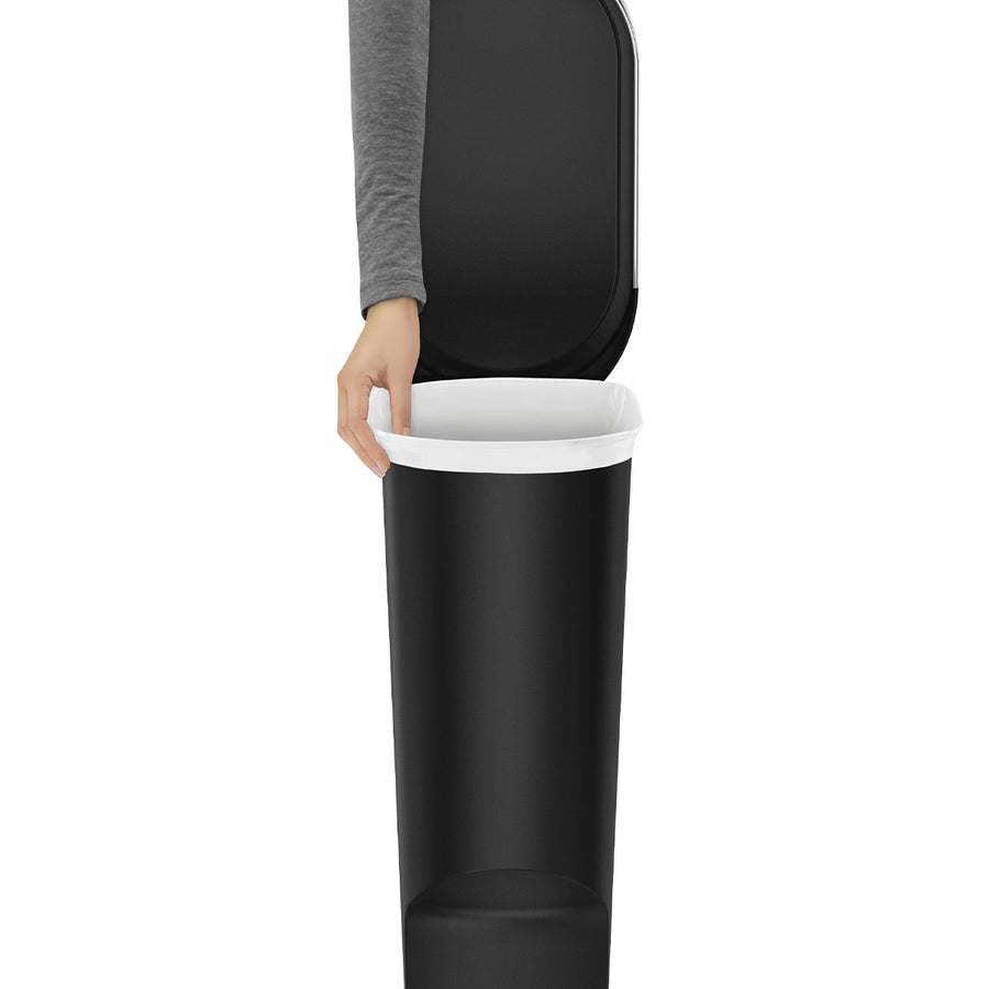 Close-up of Simplehuman 40L Slim Step Can, Matte Black Plastic, showing hand securing the liner with the liner rim.