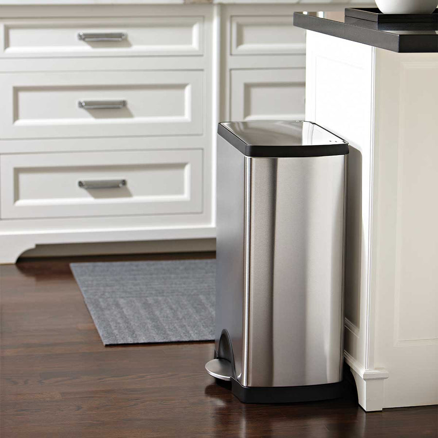 Simplehuman 38L Brushed Stainless Steel Rectangular Step Can fits close to cabinetry, hands-free operation.