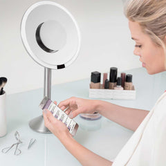 ensor mirror pro round - brushed finish - lifestyle with woman using app