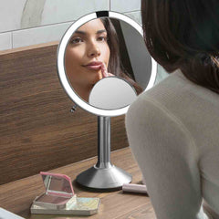 sensor mirror trio - brushed finish - lifestyle woman applying makeup