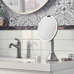 sensor mirror with touch-control brightness and dual light setting - brushed finish - lifestyle in bathroom image