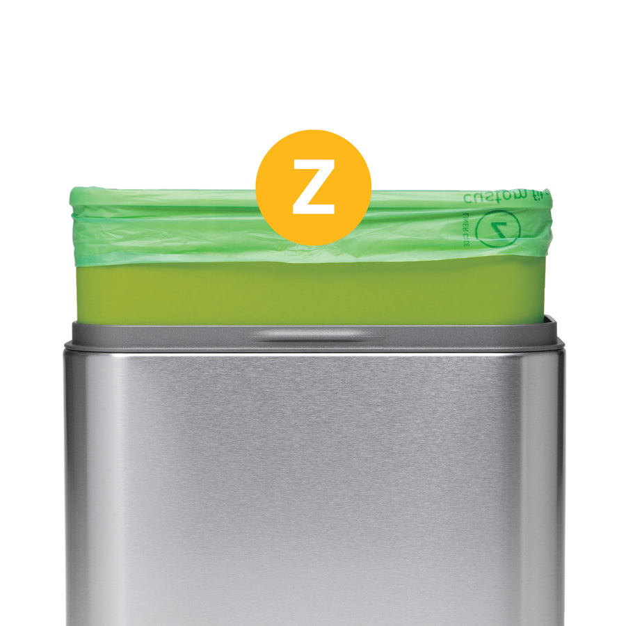 Detail view of Simplehuman Code Z Compostable Liner fitted in a Brushed Stainless Steel can, showing perfect custom fit.