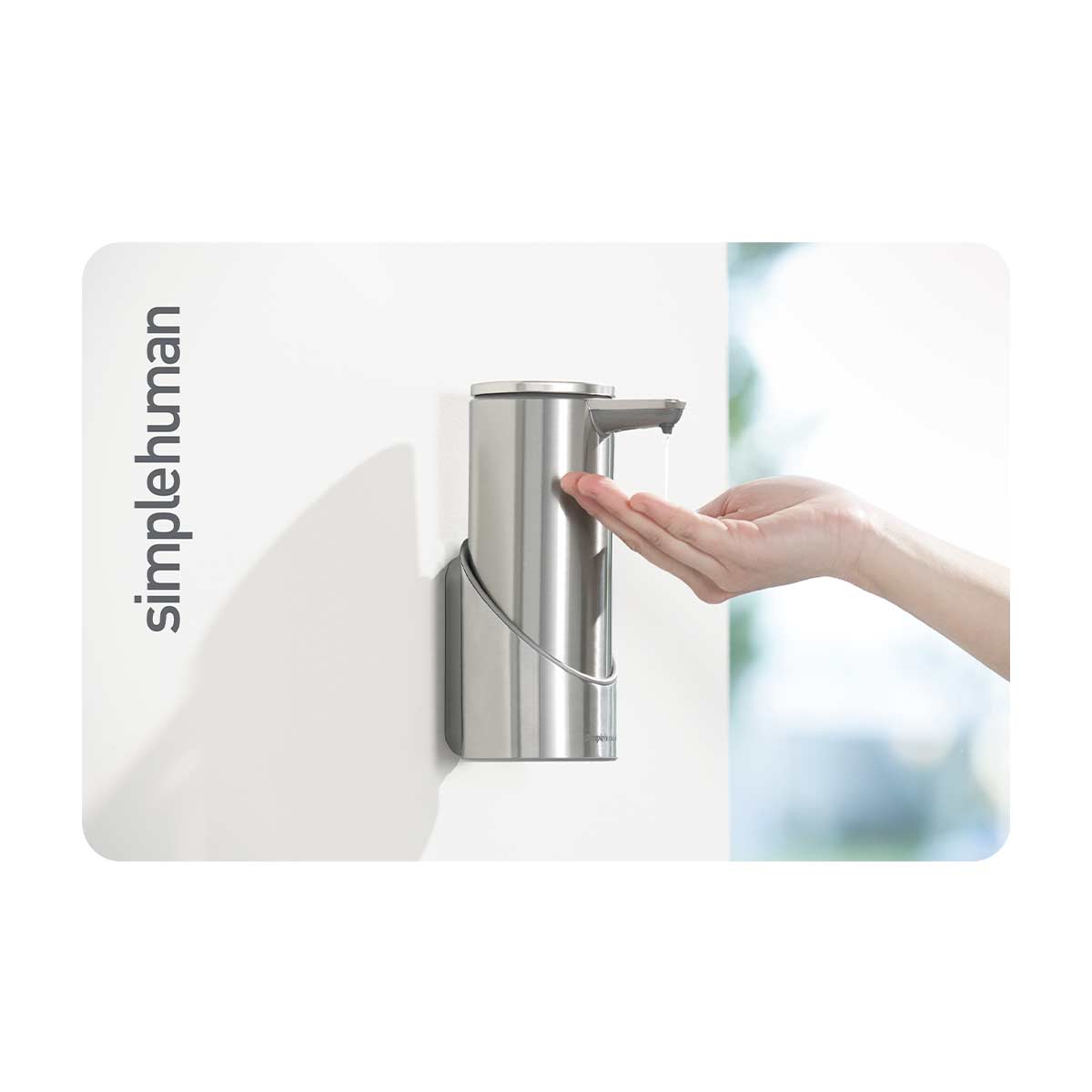 Simplehuman's Sensor Pump Gift Card design showcasing a Sensor Pump docked onto a wall dispensing sanitizer/soap.